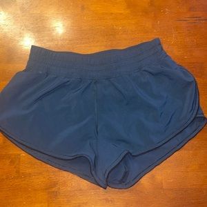 Dark green Lululemon shorts.